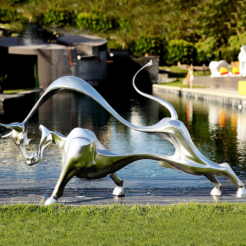 Abstract line art bull sculpture on lawn