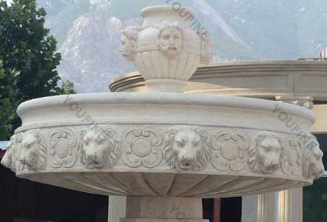 angel water fountain with lion head