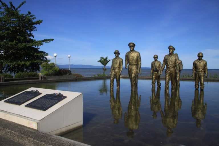 The large famous sculpture MacArthur Landing Memorial Park with seven ...