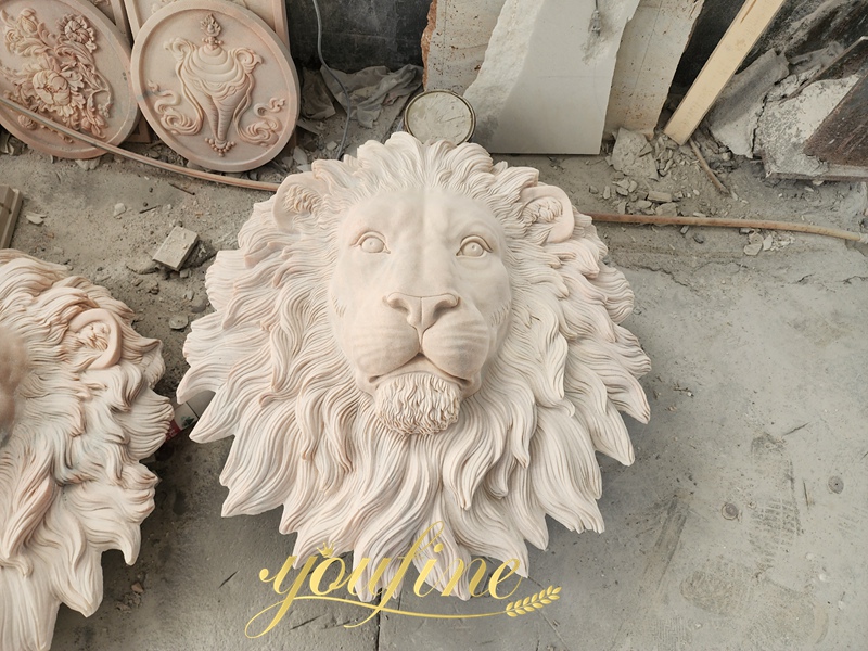 marble lion head relief