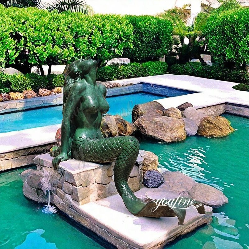 large bronze mermaid statue