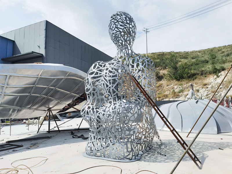 large stainless steel letter sculpture