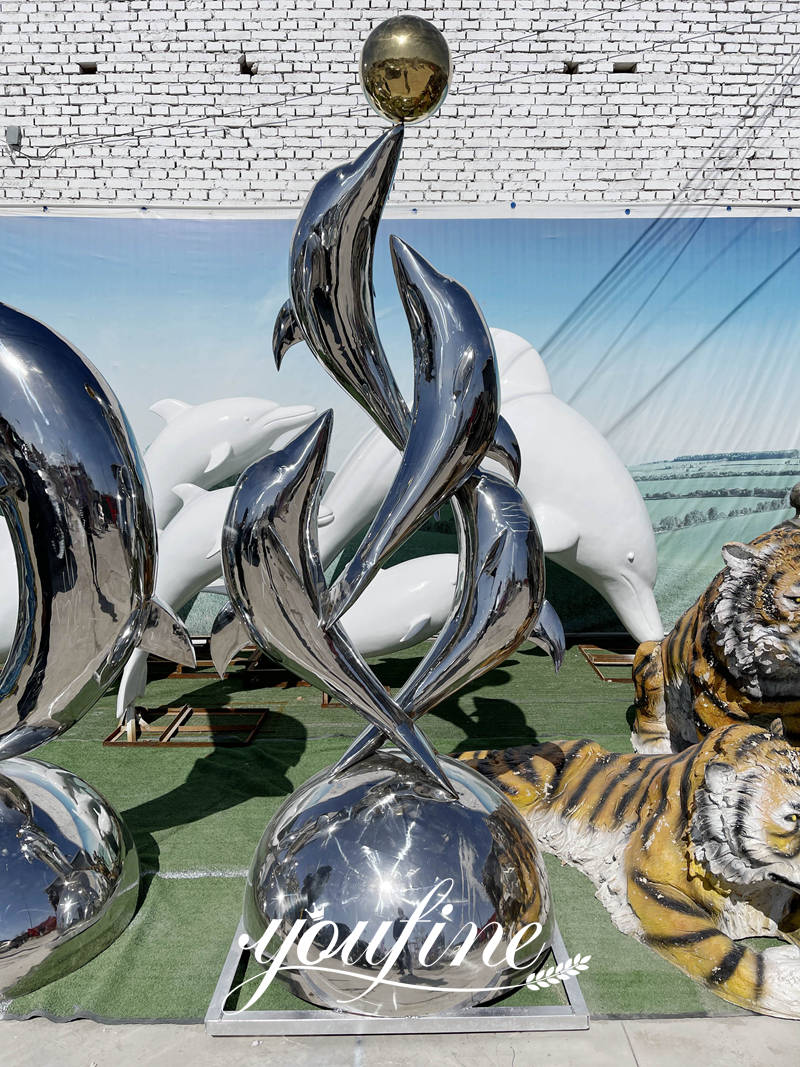 metal dolphin statue details