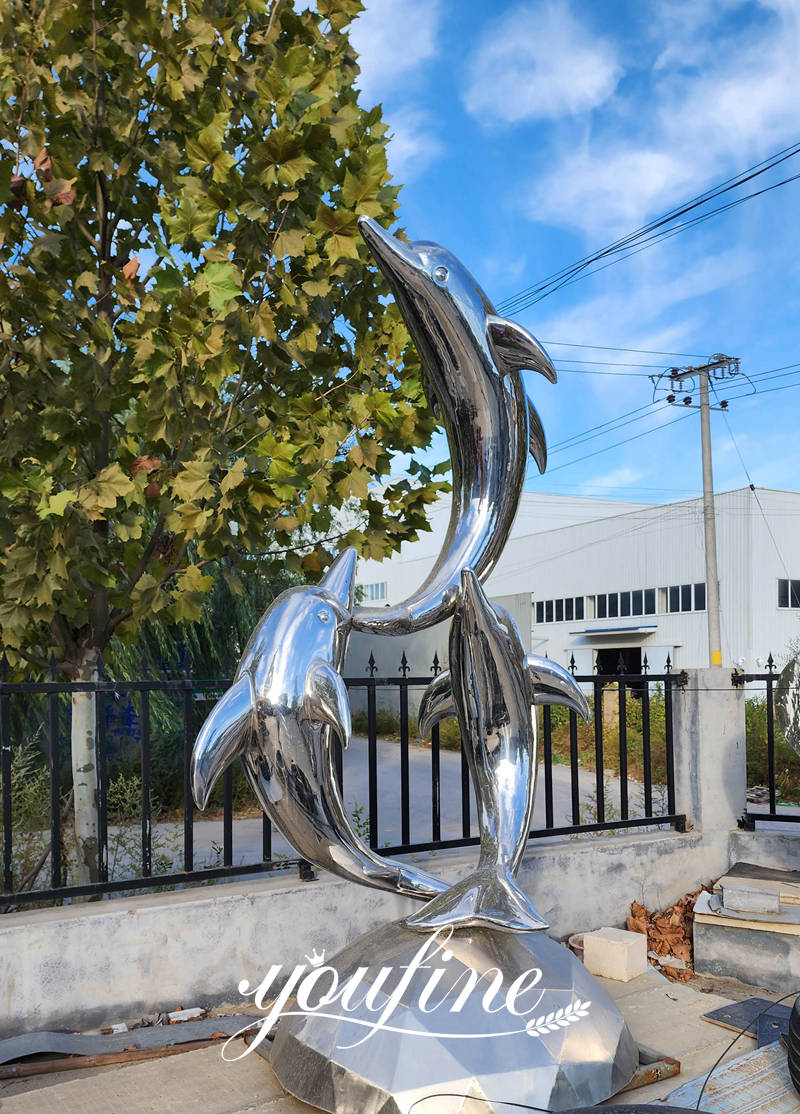 modern stainless steel dolphin statue details