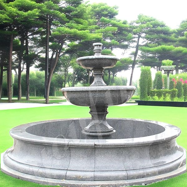 black granite-tiered water fountain