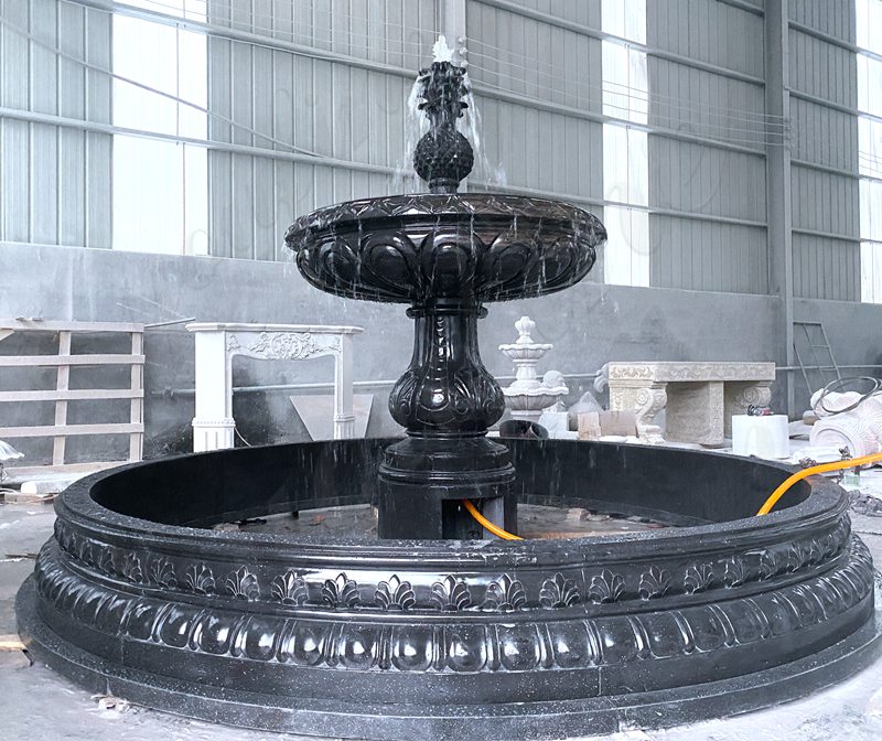 black marble tiered water fountain