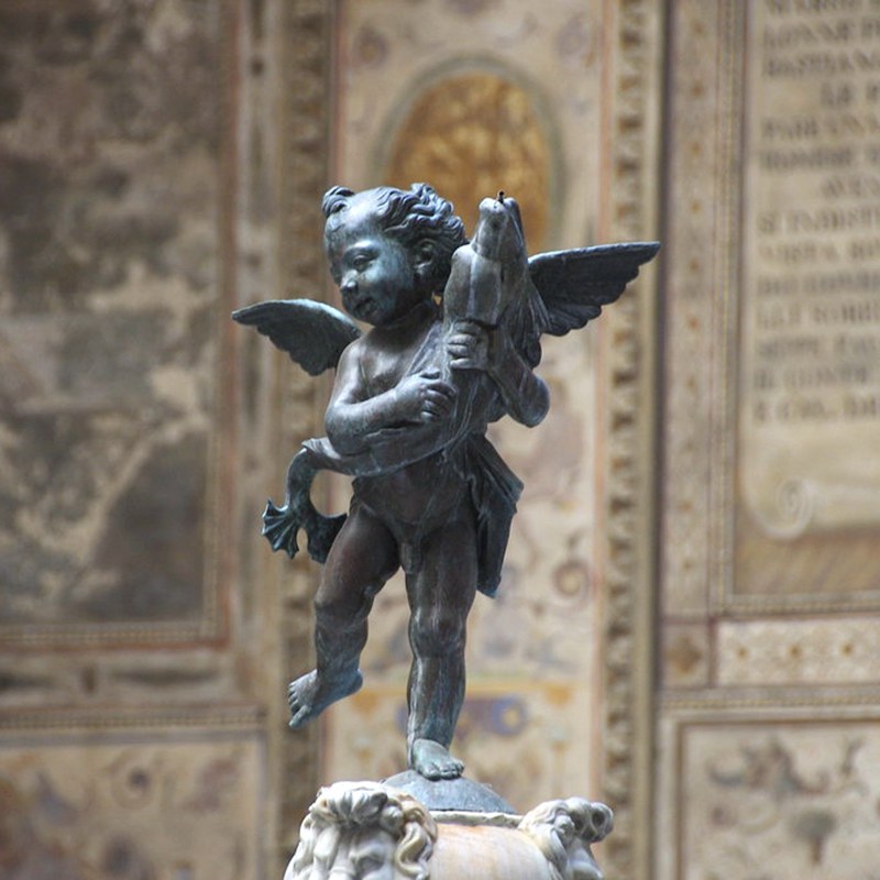 lifesize bronze Putto with dolphin