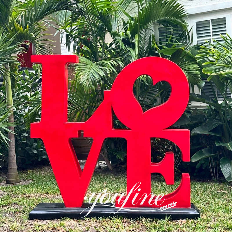 stainless steel read love sculpture