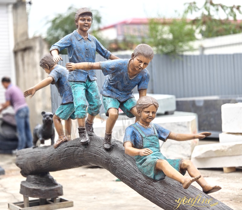 Boy and Girl Reading on Tree Branch bronze sculpture