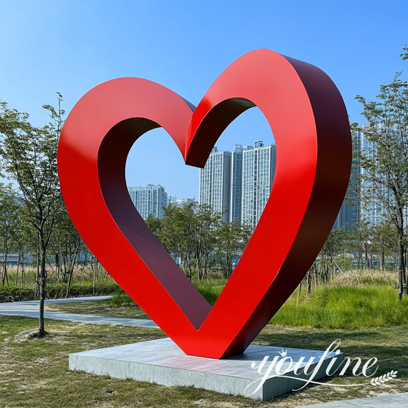 modern stainless steel red heart sculpture