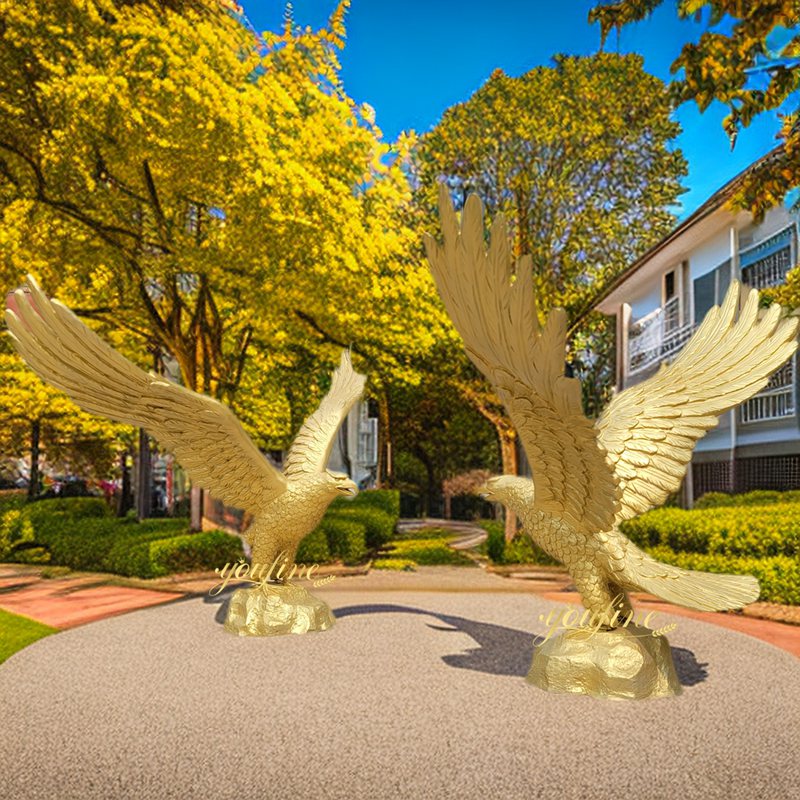 two golden eagle statue