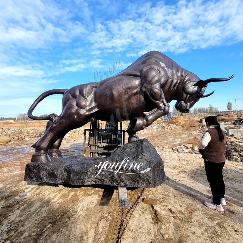 Struggling bronze Bull statue