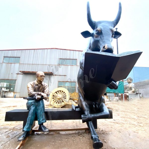 large bull reading sculpturee