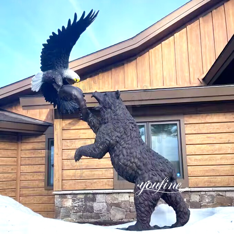 outdoor bronze bear and eagle statue