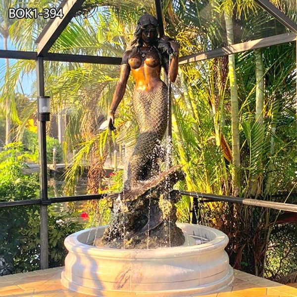 large outdoor mermaid fountain