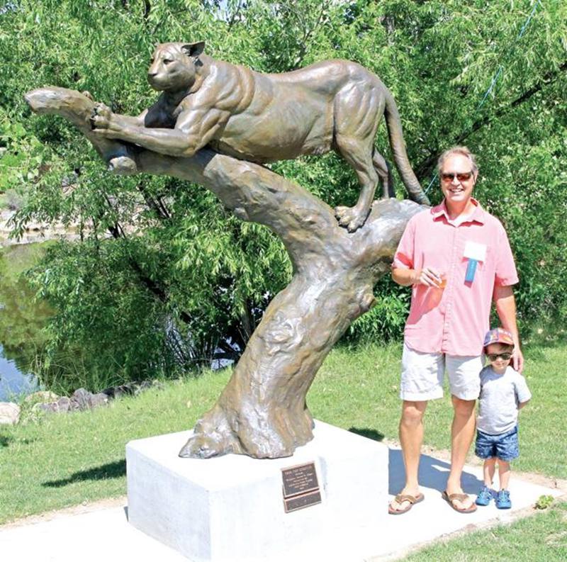 bronze mountain lion statue