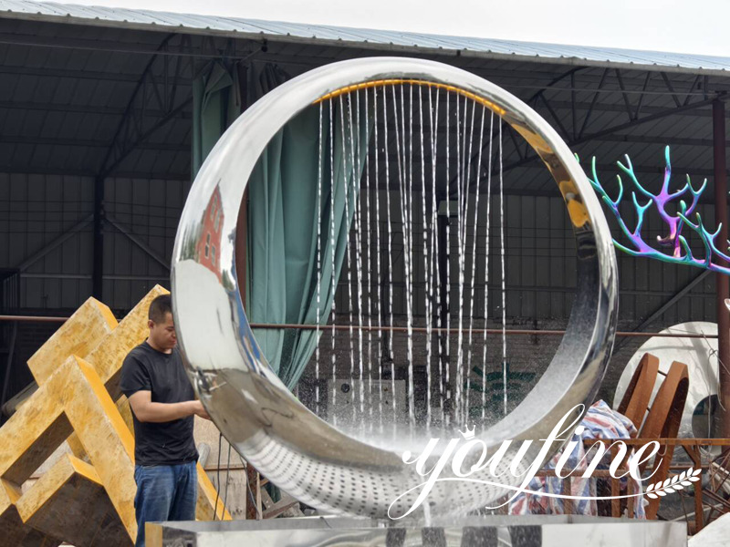 stainless steel water feature ring sculpture