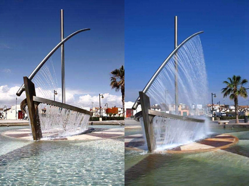 metal water boat fountain sculpture