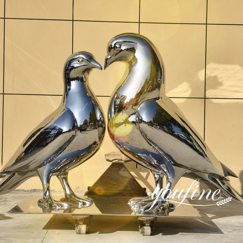 modern stainless steel bird sculpture