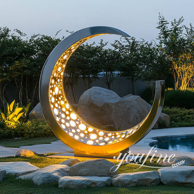 modern stainless steel crescent moon sculpture